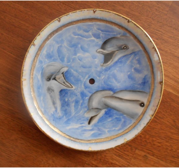orologio i delfini
